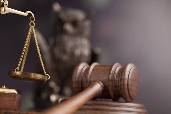 Courtroom gavel and balance scales